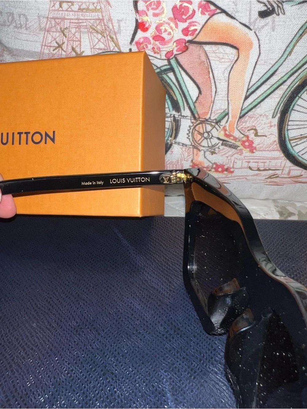 Louis Vuitton accessory glossy